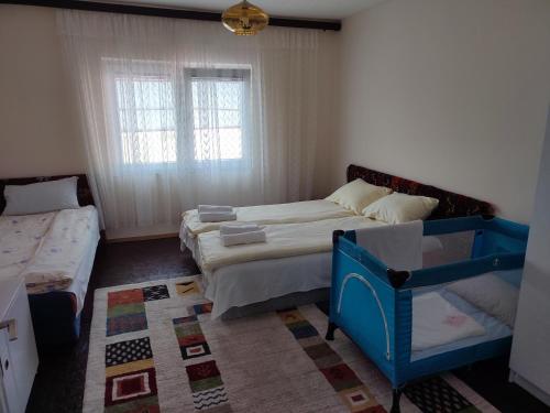 Postel nebo postele na pokoji v ubytování Čemerno Cottage