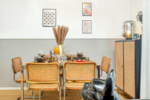 a dining room with a table and some chairs at BauHaus - Sleepwithme - Free Parking - Free Braeakfast - Very Friendly Staff in Pisa