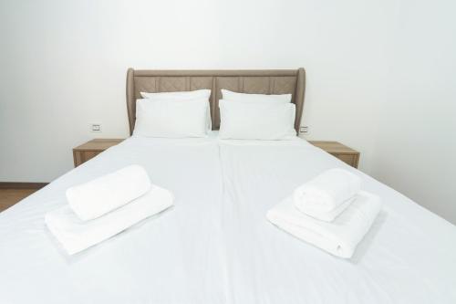Una cama o camas en una habitación de Hotel Diplomat by Aycon