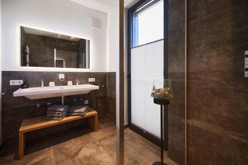 Bilik mandi di Designapartment Salzburg