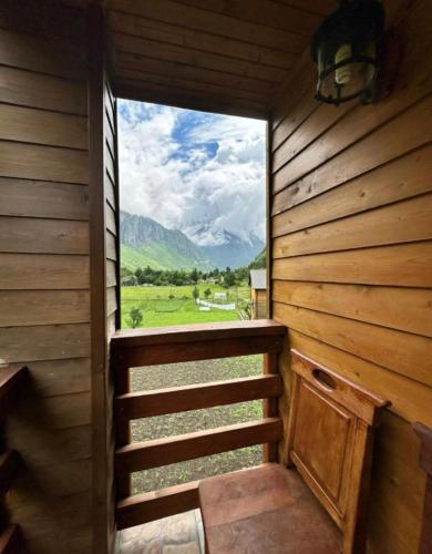 a view from the inside of a sauna with a window at Residence: Quku i Valbones in Valbonë