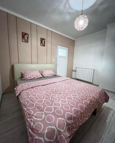 Łóżko lub łóżka w pokoju w obiekcie Apartman Lijep San