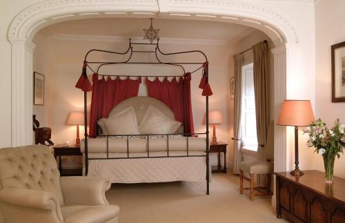 A bed or beds in a room at The Royal Hotel