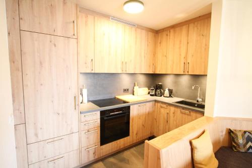 Kuchyň nebo kuchyňský kout v ubytování Ferienwohnung 77 - Top 23