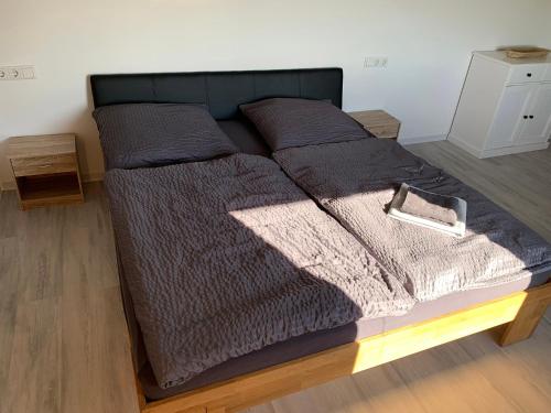Cama o camas de una habitación en Ferienhaus Liebchen free Netflix