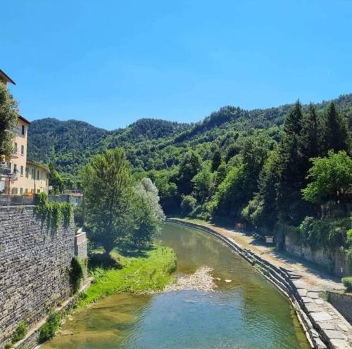 a view of a river from a bridge at La Capanna in Marradi