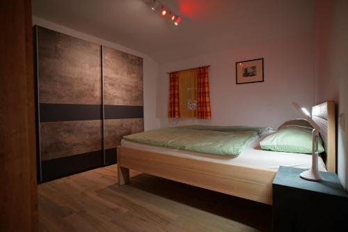 Postel nebo postele na pokoji v ubytování Ferienwohnung Jeni