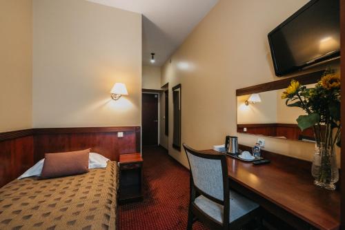 Postel nebo postele na pokoji v ubytování Hotel Rinno