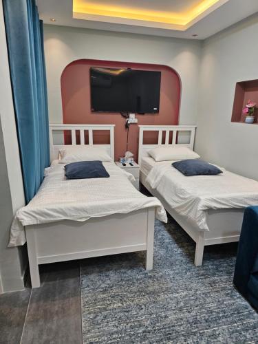 Postel nebo postele na pokoji v ubytování afnan farm