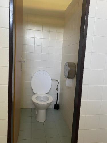 a bathroom with a toilet in a stall at Pláž Výtoň in Přední Výtoň