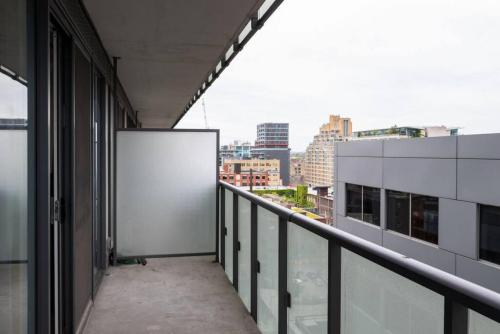 an empty balcony with a view of a city at Exec 1 BR Ent District MTCC Jays with Parking in Toronto