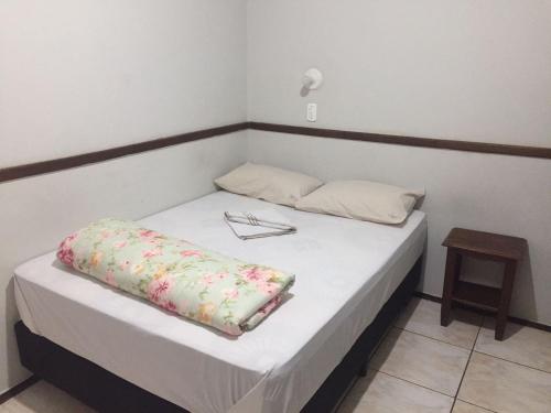 Un ou plusieurs lits dans un hébergement de l'établissement ORSI HOTEL