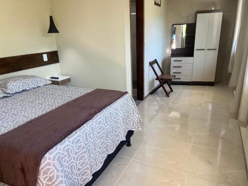 Katil atau katil-katil dalam bilik di Casa nas Montanhas em Domingos Martins