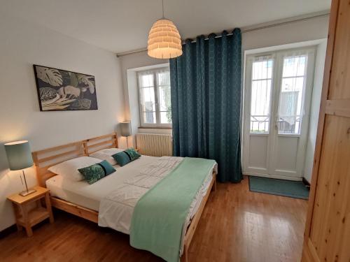 Voodi või voodid majutusasutuse Villas du Lac toas