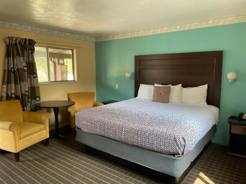 Ένα ή περισσότερα κρεβάτια σε δωμάτιο στο Best Motel