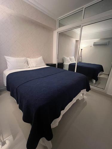 Ensanche Savica de MendozaにあるBlue Gem Retreat 3BR Apartment w Modern Amenitiesのギャラリーの写真