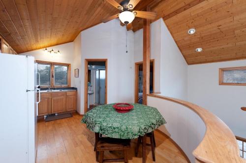 a dining room with a table and a ceiling fan at CR 213 - 2 Bedroom in Durango
