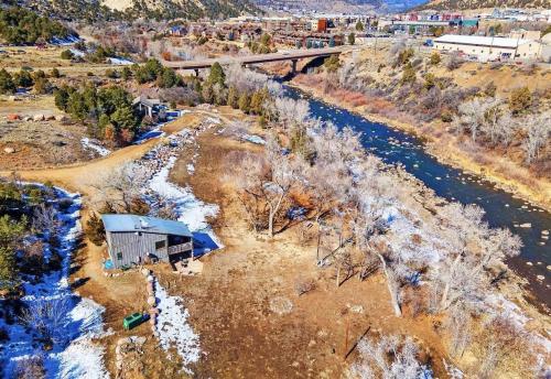 an aerial view of a building next to a river at CR 213 - 2 Bedroom in Durango