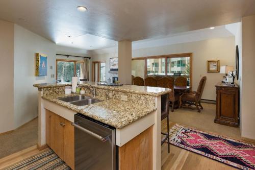 a kitchen with a sink and a counter top at Village Center 611 in Durango Mountain Resort