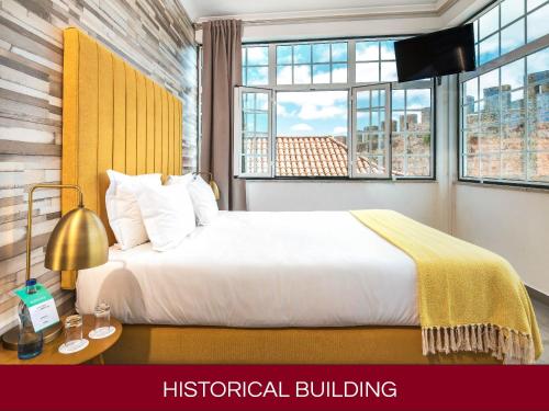 Krevet ili kreveti u jedinici u okviru objekta Casa Senhoras Rainhas AL - Obidos - by Unlock Hotels