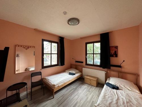Postel nebo postele na pokoji v ubytování Belle Vue