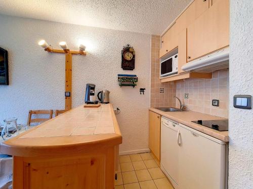 Studio duplex confortable au pied des pistes avec balcon - FR-1-344-921