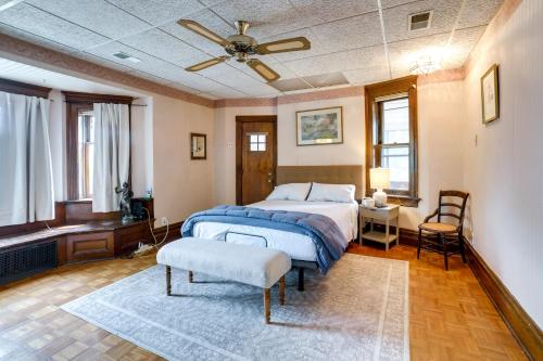 a bedroom with a bed and a ceiling fan at Spacious Pittsburgh Rental Walk to Frick Park! in Pittsburgh