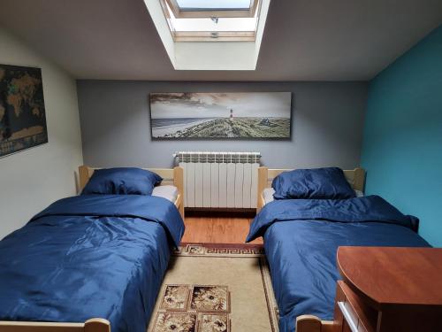 Postel nebo postele na pokoji v ubytování Apartament Rynek 7 - FV