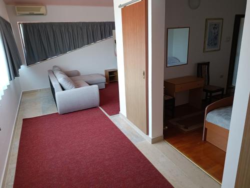 Ένα ή περισσότερα κρεβάτια σε δωμάτιο στο Hotel Holiday