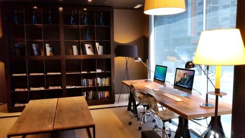 TV a/nebo společenská místnost v ubytování Hotel Barcelona Universal