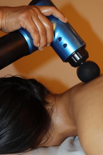 a woman getting her hair cut with a blow dryer at Rado Hotel - Santa María in Trujillo