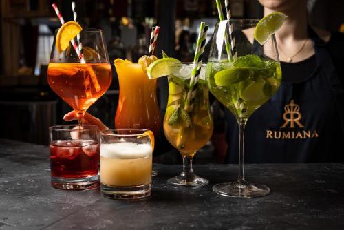 a group of four drinks sitting on a table at Hotel Diamond w Białym Dworku in Rumia