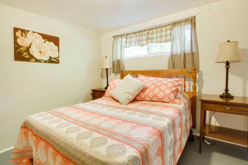 a bedroom with a bed and a window at Lexington Apt Rental Near VA Military Institute! in Lexington