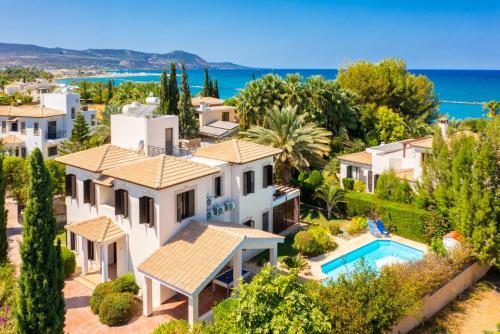 an aerial view of a villa with a swimming pool at Villa Iliana in Polis Chrysochous
