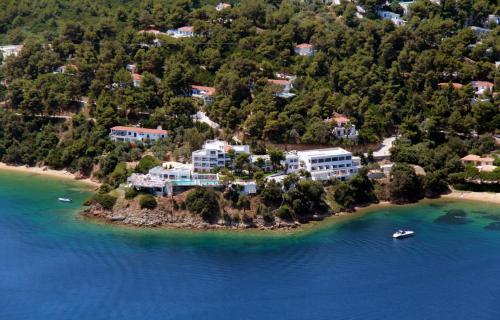 an aerial view of a resort on an island in the water at Cape Kanapitsa Hotel & Suites in Kanapitsa