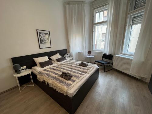 Postel nebo postele na pokoji v ubytování D58 Superior Apartments in the city center