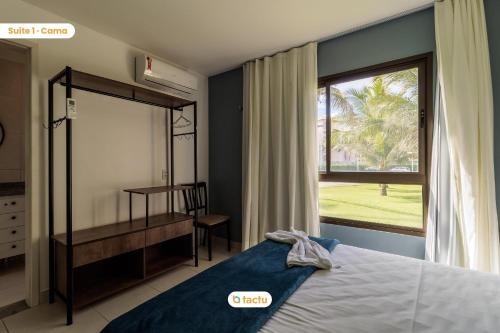 Giường trong phòng chung tại Térreo espaçoso e próximo a Piscina no VG Sun