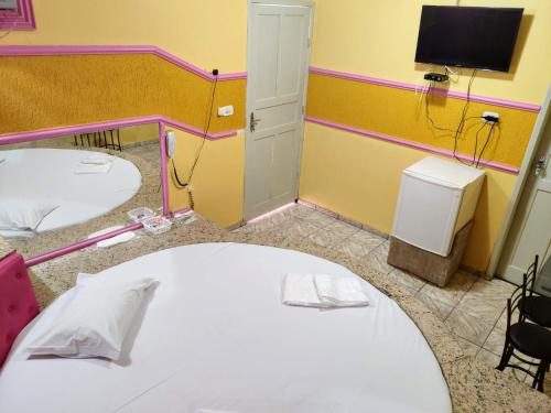 Postel nebo postele na pokoji v ubytování Hotel Paraíso