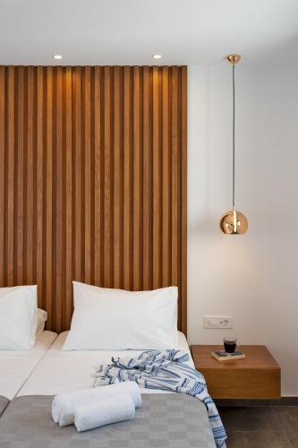 Ένα ή περισσότερα κρεβάτια σε δωμάτιο στο Ventus Villas