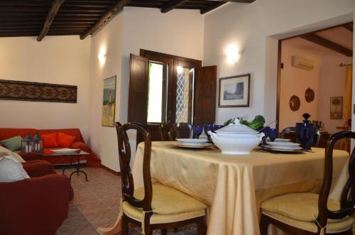 a table with a bowl on it in a living room at Dimora La Grazia in Castelvetrano Selinunte