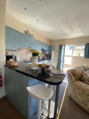 a kitchen with a counter top in a room at Salcombe View in Kingsbridge