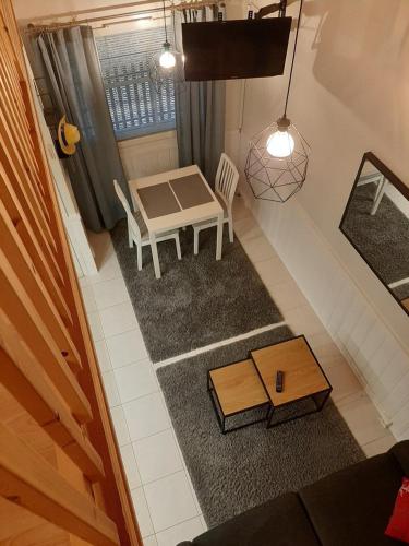 an overhead view of a living room with a table and chairs at Aparthotel LeviStar in Levi