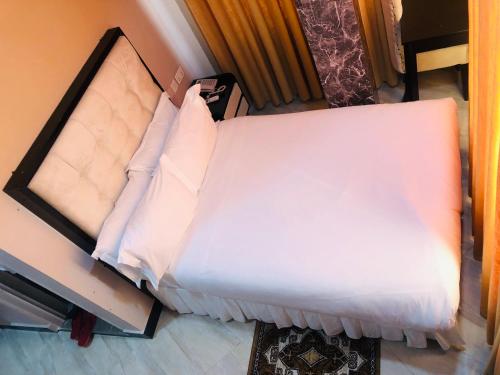 Un ou plusieurs lits dans un hébergement de l'établissement Diary Hotel