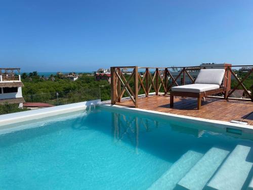 Bazén v ubytování sunsteps casa holbox nebo v jeho okolí