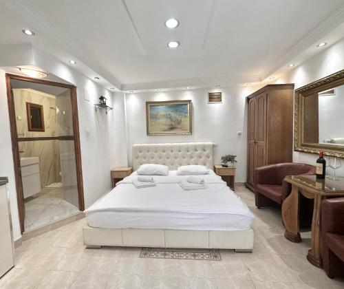 Una cama o camas en una habitación de Vinograd