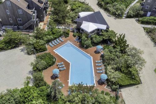 an overhead view of a swimming pool in a resort at Unit 1912 Ocean Colony Beach in Amagansett