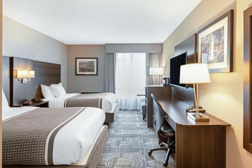 Ένα ή περισσότερα κρεβάτια σε δωμάτιο στο Best Western Milton