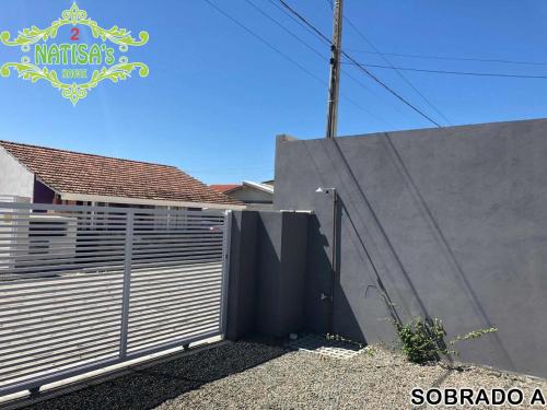 Gambar di galeri bagi Sobrados aconchegante com piscina "Natisashouse" di Bombinhas
