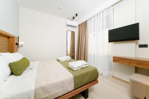Φωτογραφία από το άλμπουμ του Azzure Luxury Suites στον Ποτό
