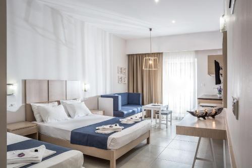 Posteľ alebo postele v izbe v ubytovaní Sea View Hotel & Apartments